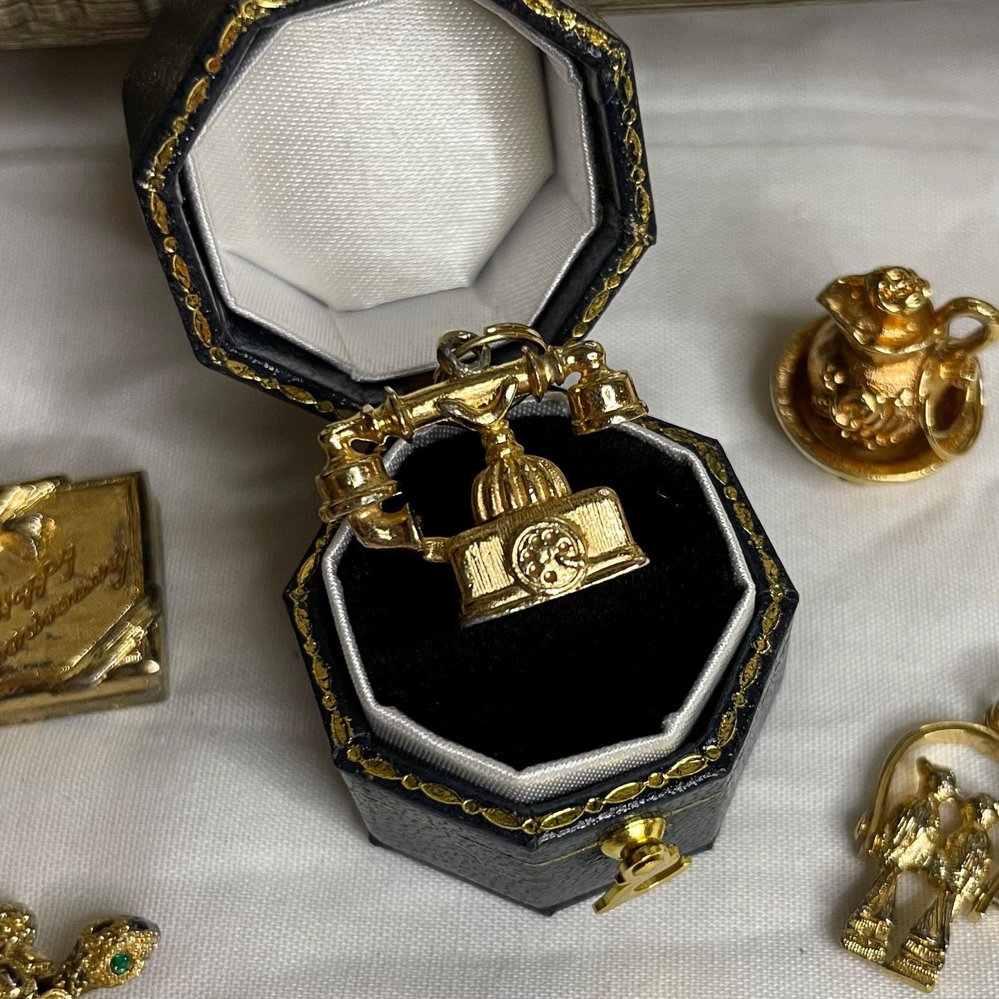 Gold Toned AVON Phone Charm